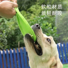 Interactive dog game toy being used outdoors for playful training.